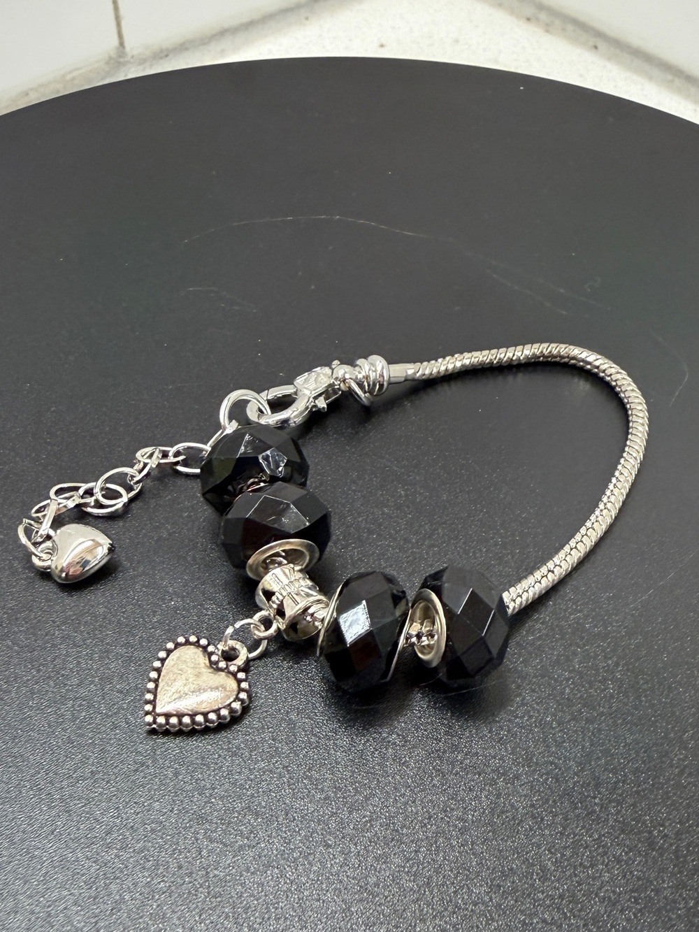 Silver Bracelet with Black Faceted Beads and Heart Charm